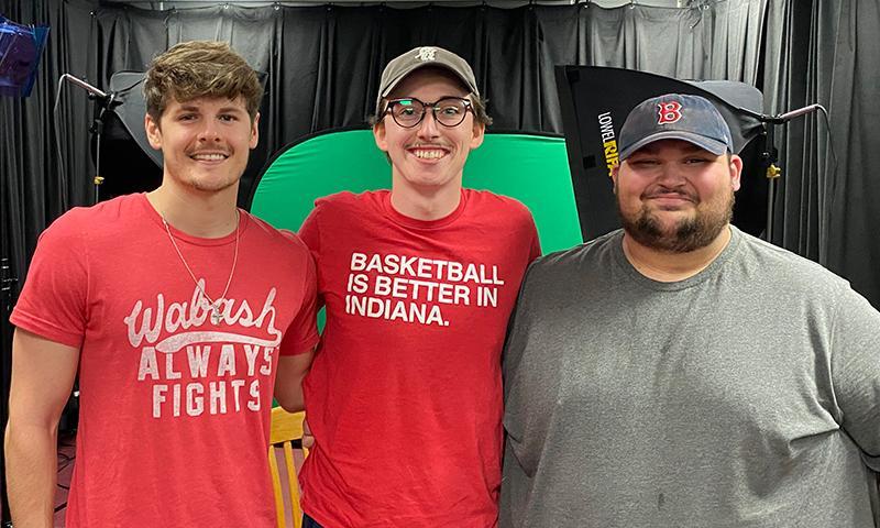 Jakob Faber ’23, Jacob Paige ’23, and Jakob Goodwin ’23 outside the podcast studio for the final time as students.