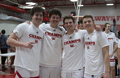 Davidson and teammates after the NCAC Championship game