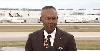 Houston Mills 85, Vice President of Flight Operations for UPS, speaks to the press after piloting the first shipment of the Pfizer COVID-19 vaccine to Louisville. 
